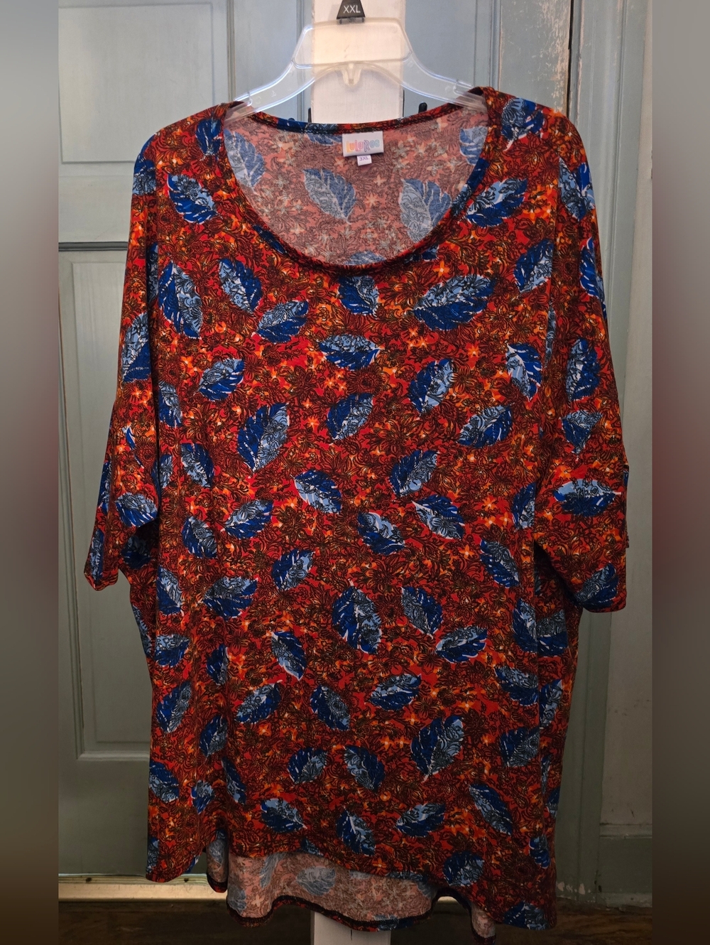 LuLaRoe Irma Red And Orange Tunic with Bold Blue Leaf Print